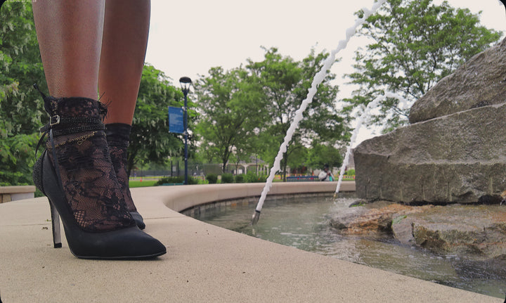 Side view of black lace ankle socks styled with platform heels – breathable, feminine accessory for chic looks