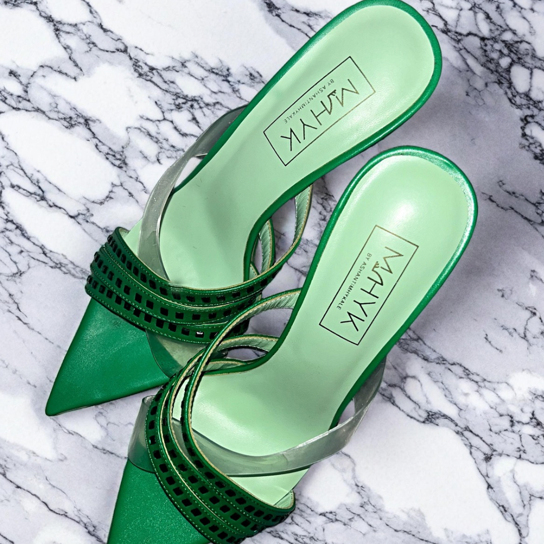 Envy green mules shown from above, front view highlighting square toe shape and smooth upper material.