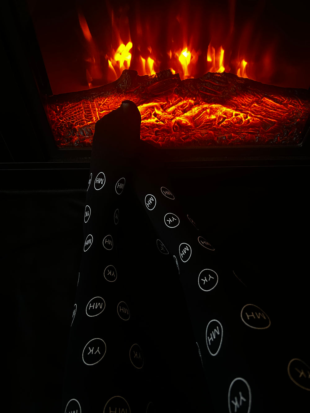 Model wearing logo laced black socks by firs place 