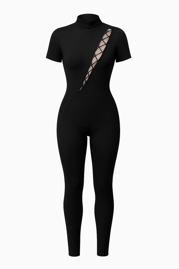 Model wearing front display of black jumpsuit, standing up, with white studio background 
